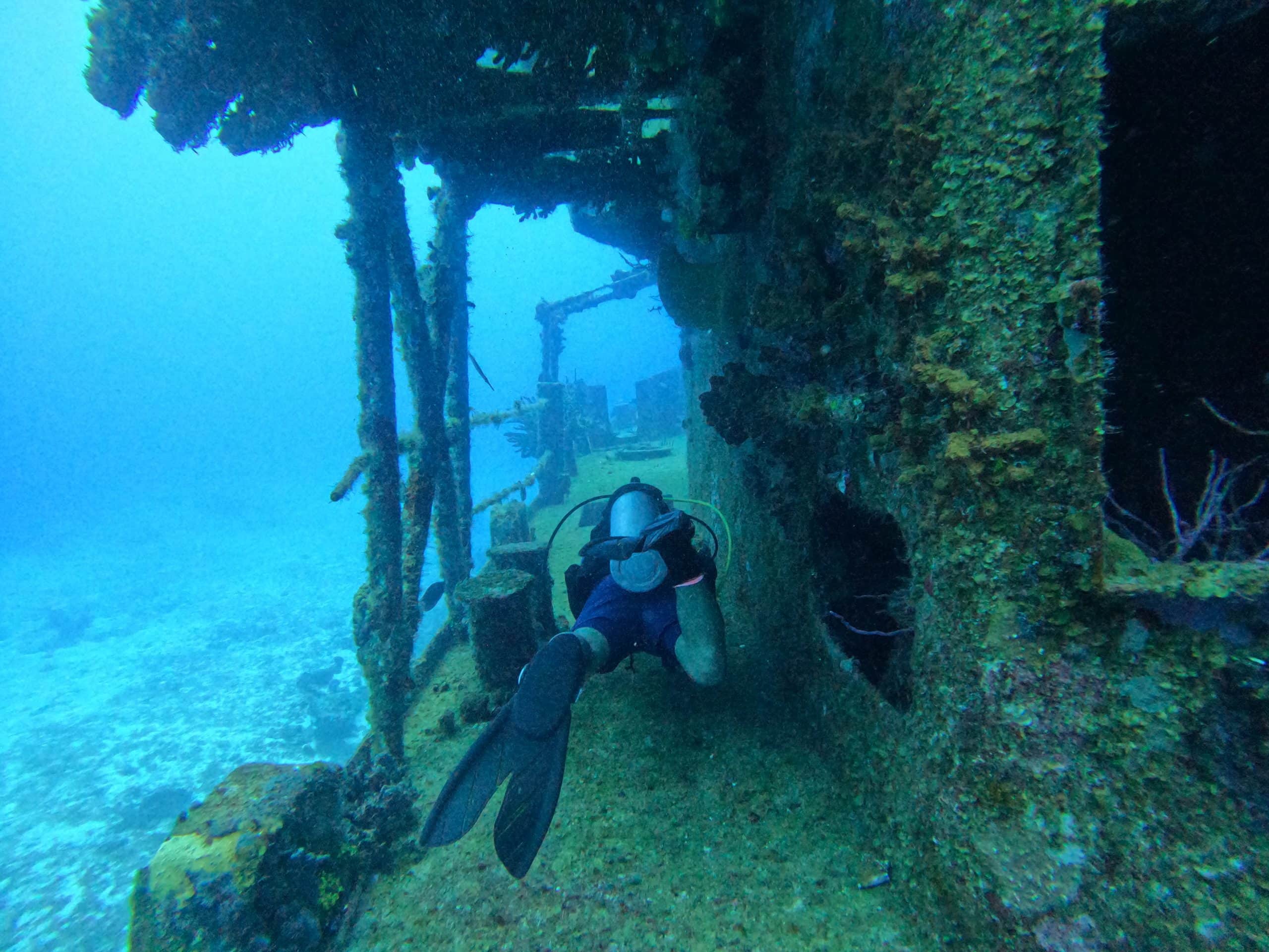 Scuba-Diving-Cozumel scuba diver in Cozumel diving the C-53 Wreck.