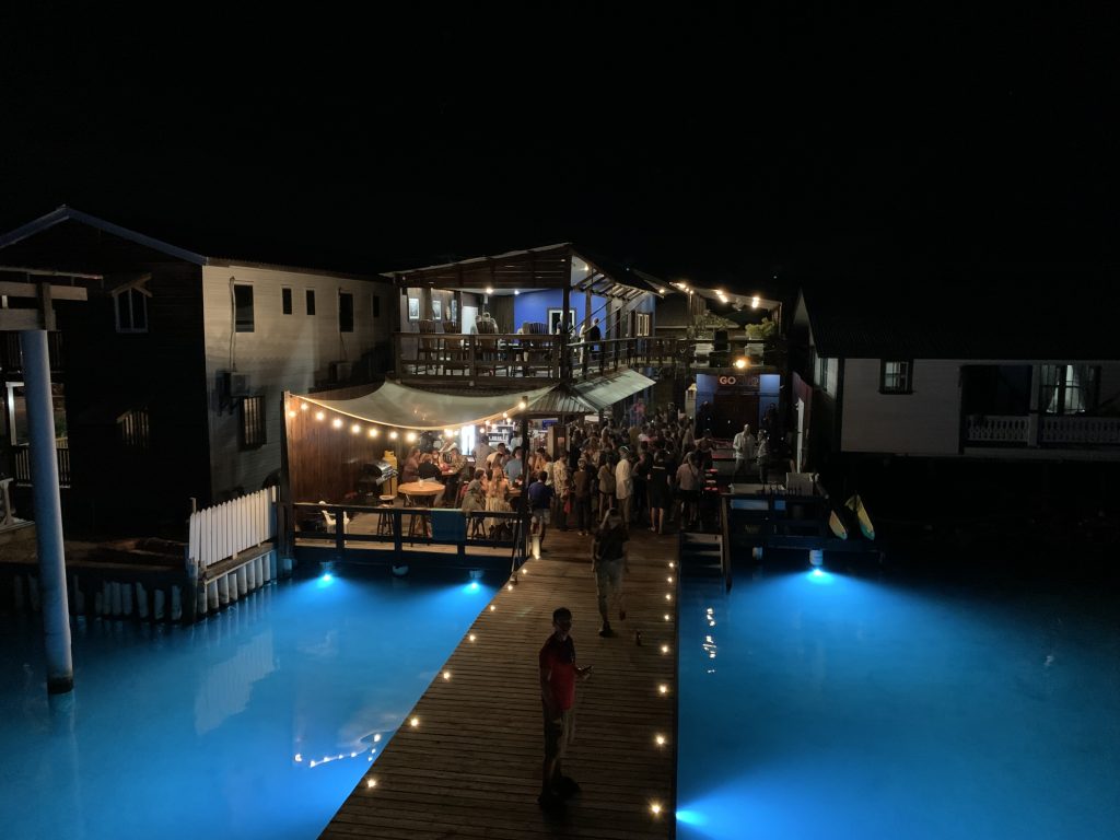 A party at the dock of the Utila Dive Center.