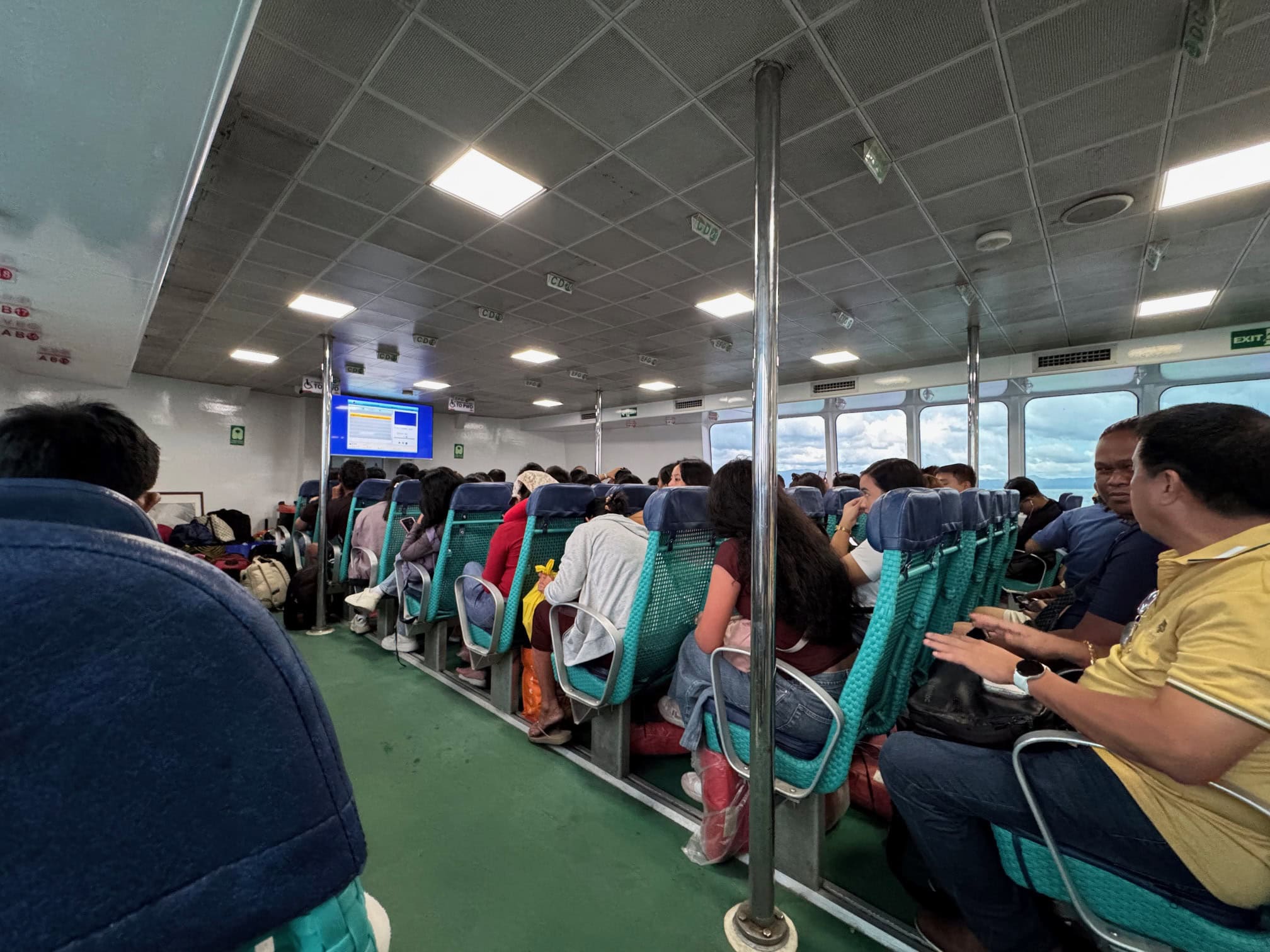 Inside seating view of an OceanJet ferry to Bohol.