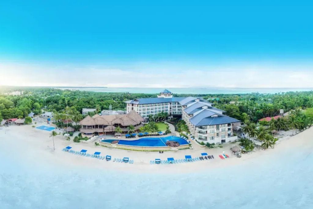 Bellevue Resort pool and beach: The Bellevue Resort in Panglao is ideal for families and couples seeking privacy, comfort, and kid-friendly amenities