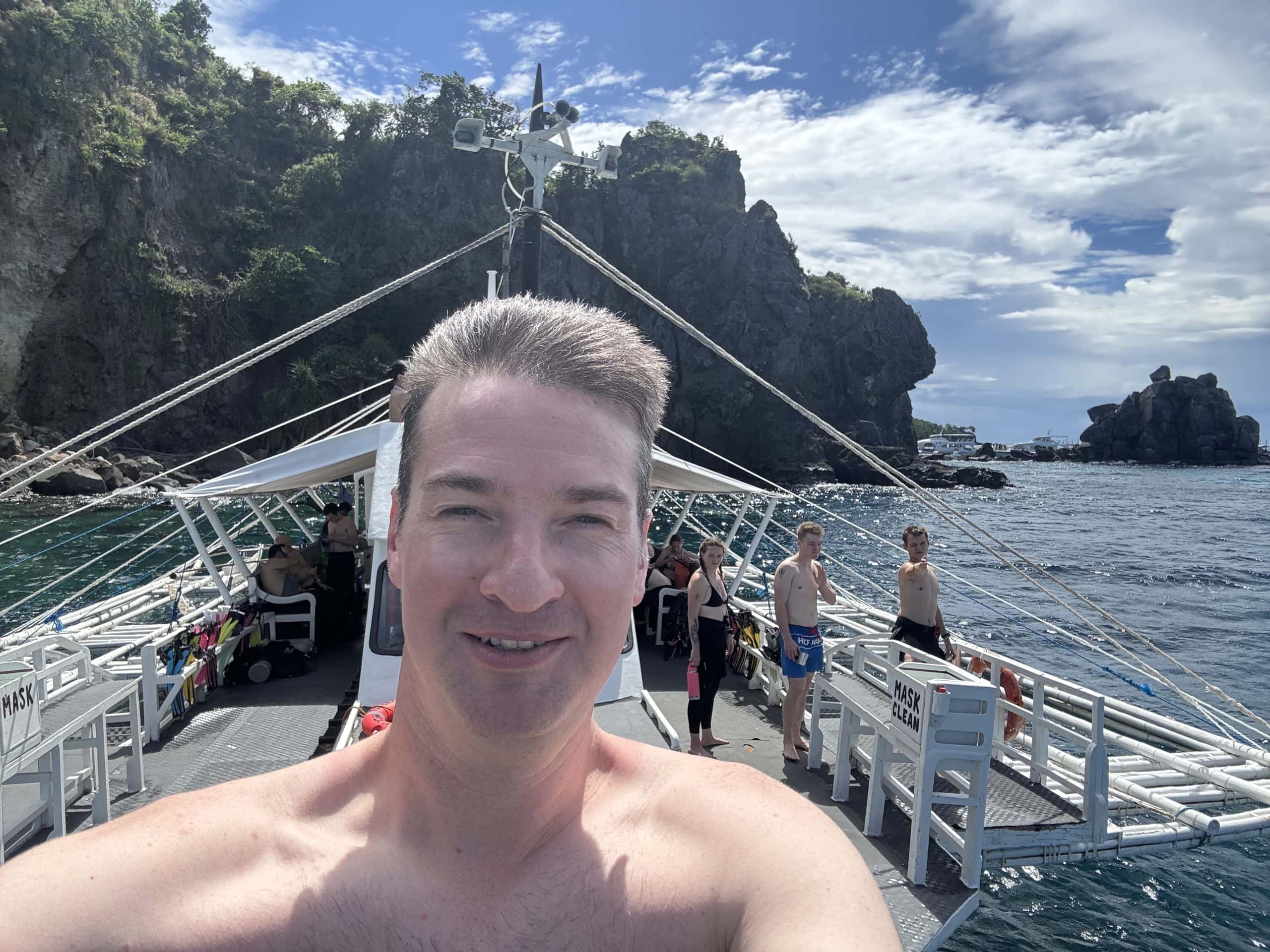 Crystal clear waters above the coral reef at Apo Island