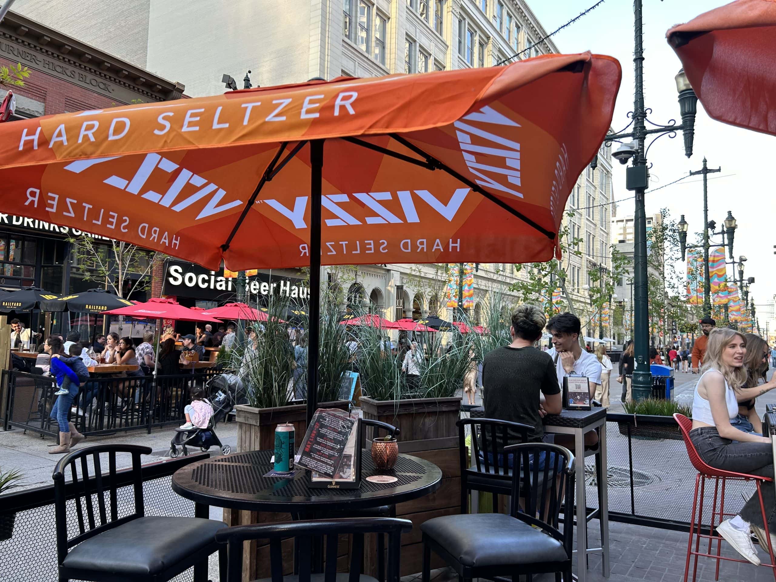 A stylish patio on Stephen Ave downtown Calgary with coffee and food in Calgary’s downtown.