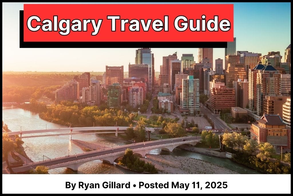Calgary skyline at sunset showcasing the downtown core with the Bow River in the foreground.