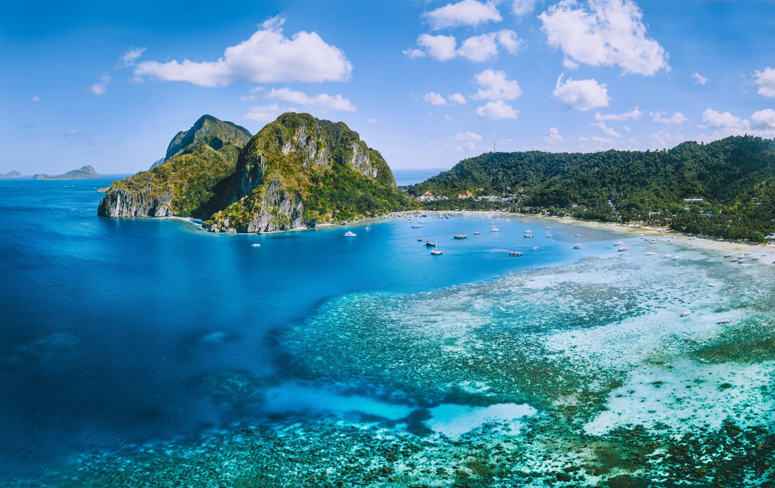 Aerial view of Corong-Corong Lagoon in El Nido, Palawan with dramatic limestone cliffs