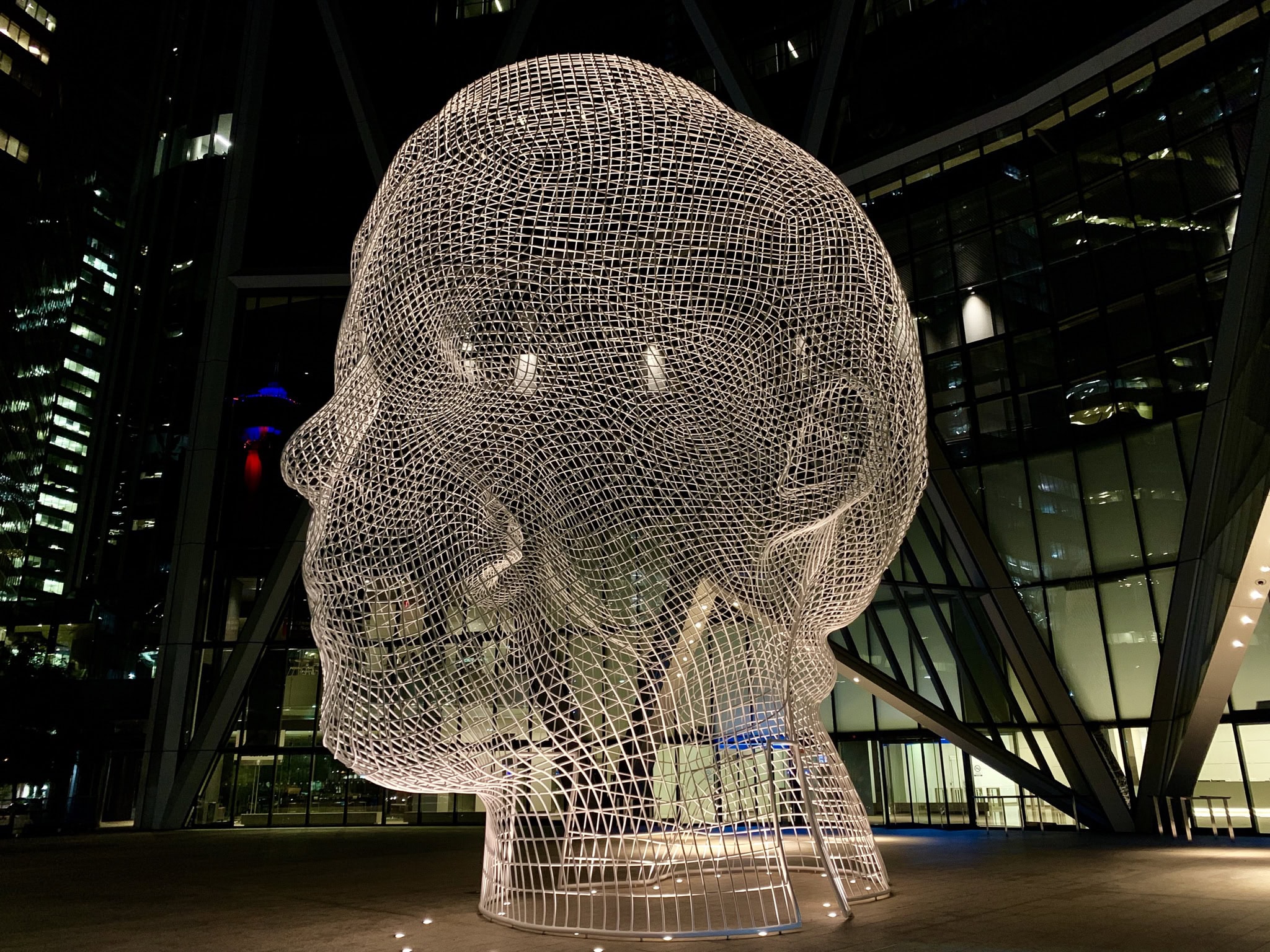 The Wonderland sculpture of a giant head outside The Bow skyscraper in downtown Calgary.