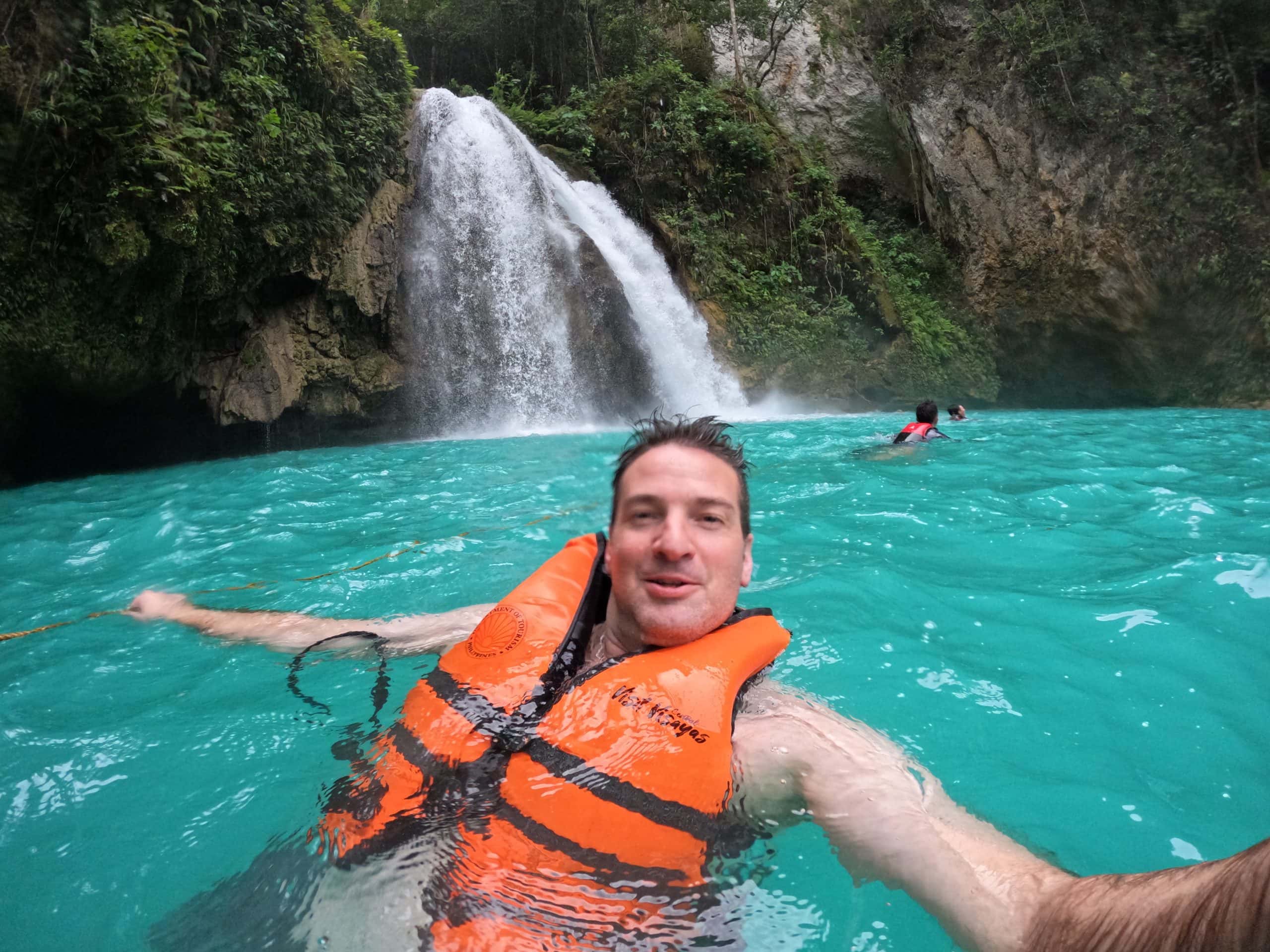 Peaceful float scene through one of the jungle pools on the canyoneering route.