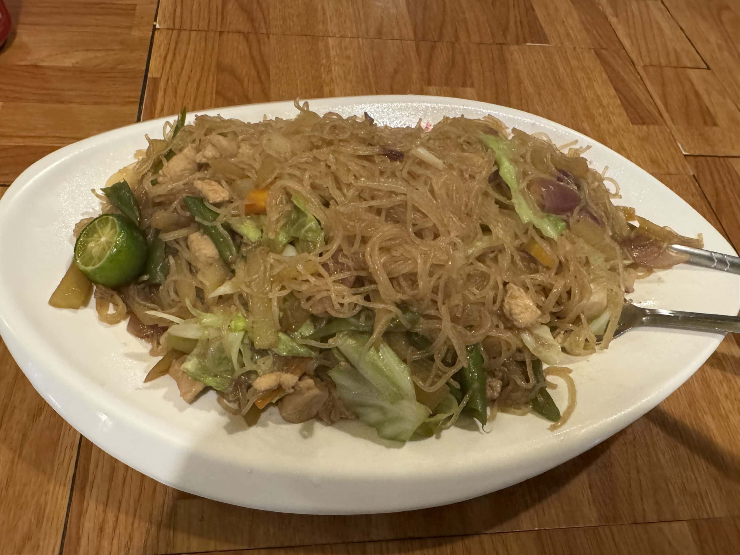 Pancit bihon meal at Mila's Guest House in Moalboal, Cebu, Philippines.