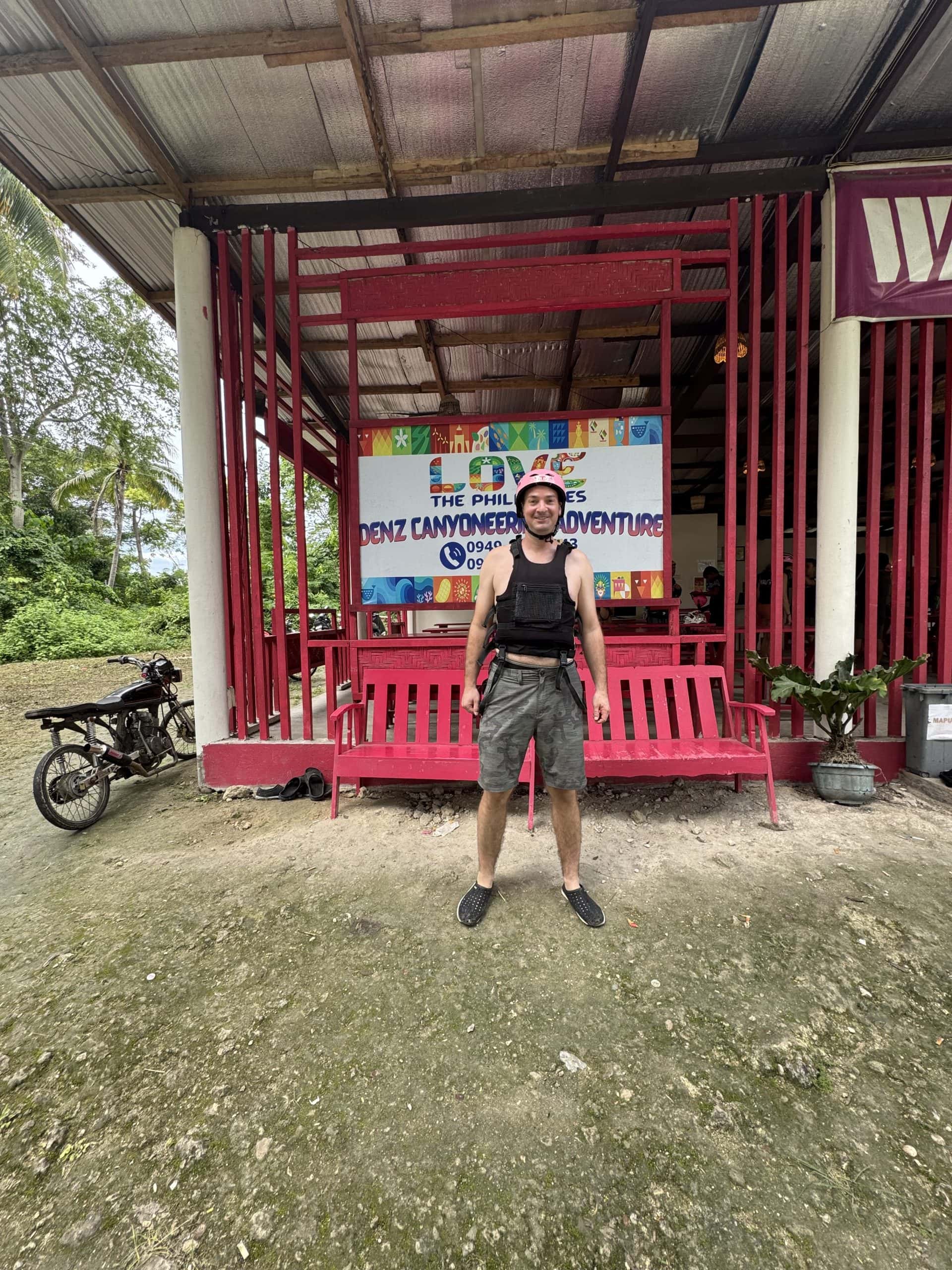 Traveler geared up at the Denz Canyoneering Adventure starting point near Kawasan Falls, ready for an epic Moalboal canyoneering tour in Cebu, Philippines.