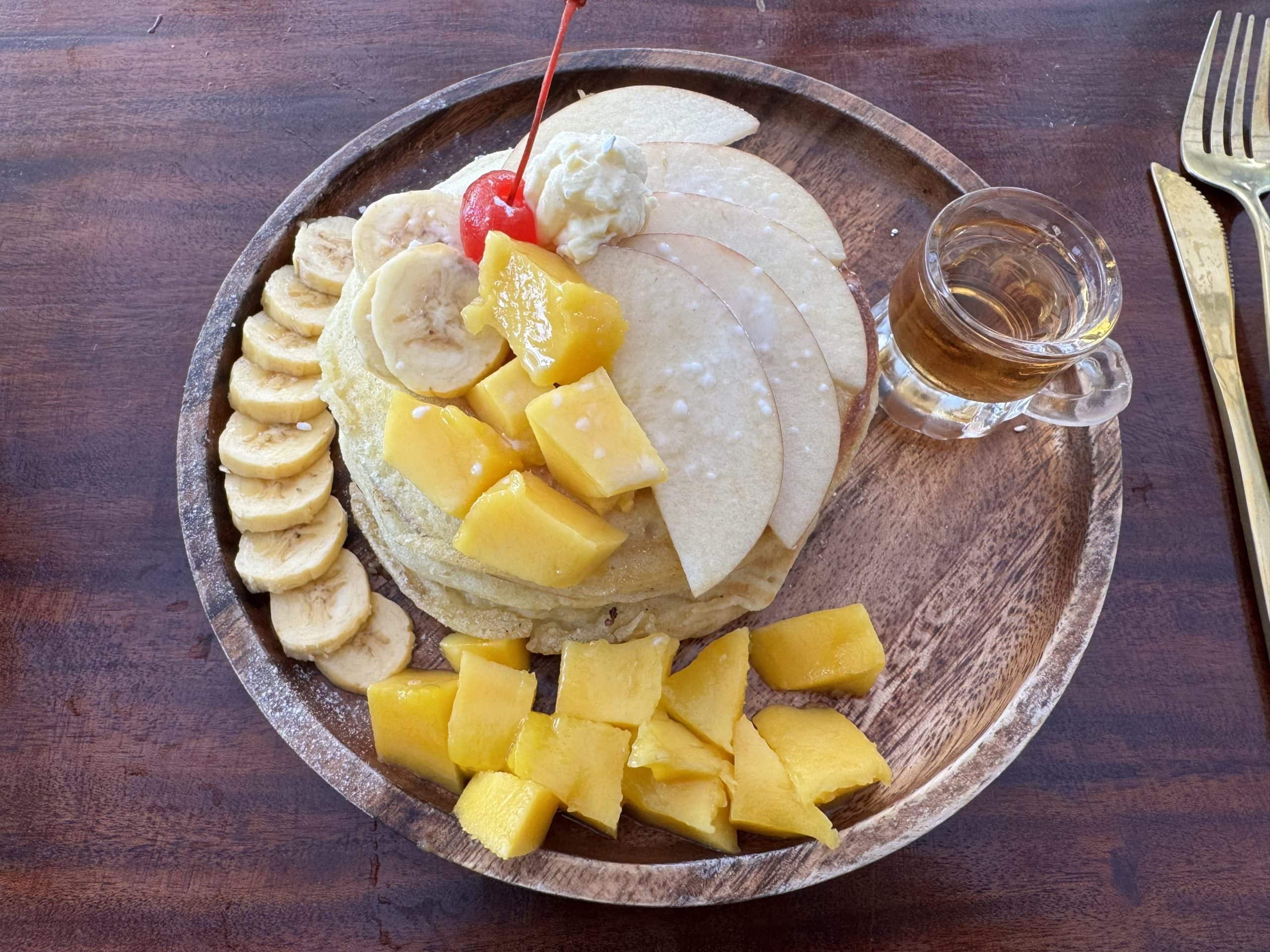 Popular budget hostel in Moalboal known for its social vibe, bright blue exterior, and affordable rooms for backpackers and great food.