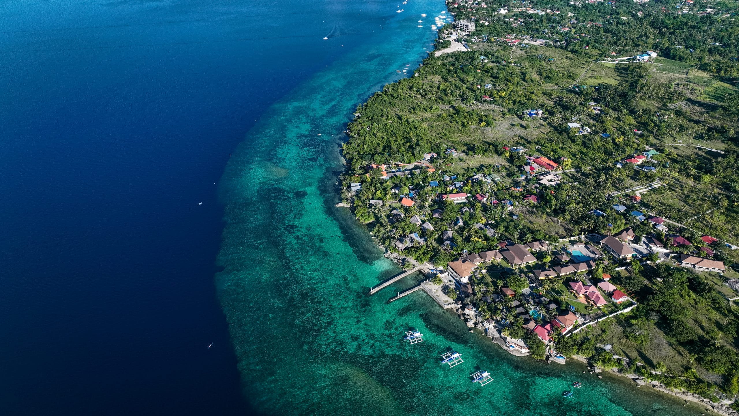 Discover Panagsama Beach in Moalboal, Cebu—home of the world-famous sardine run, vibrant coral reefs, and laid-back coastal vibes. A must-visit for divers, snorkelers, and adventure seekers in the Philippines.