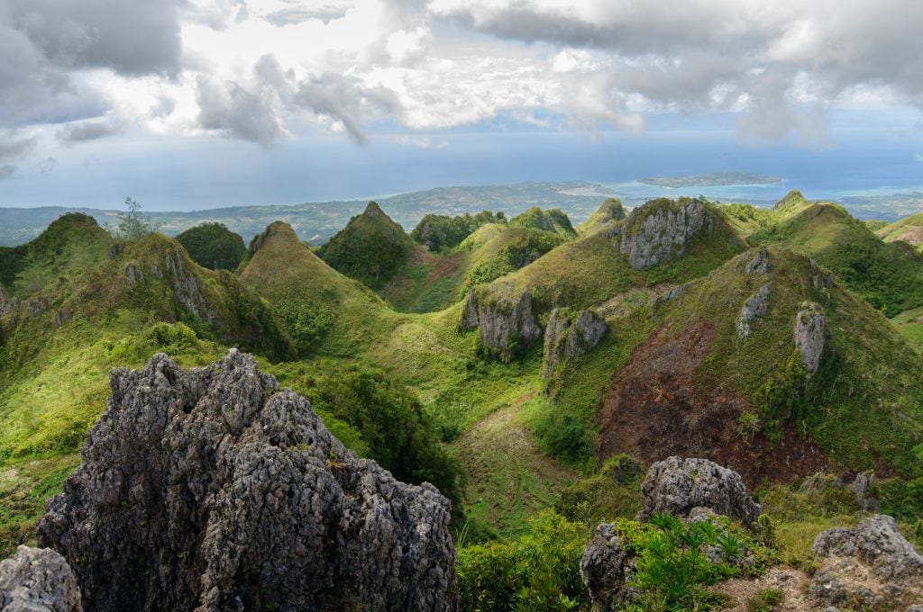 Aerial drone view of the beautiful scenery of Osmena Peak in the Philippines under the cloudy sky