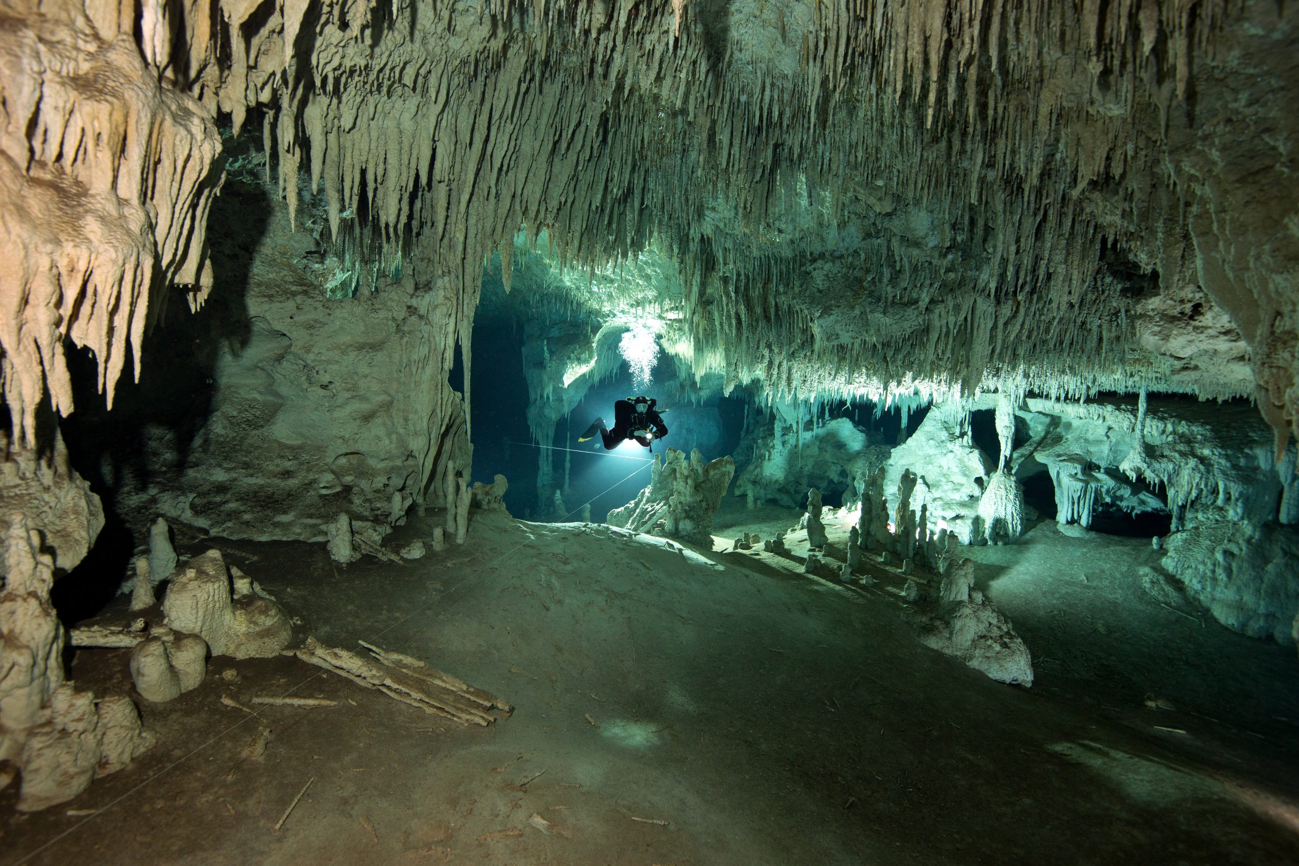 Mexico, Tulum, Cave diver exploring the Sistema Dos Ojos.