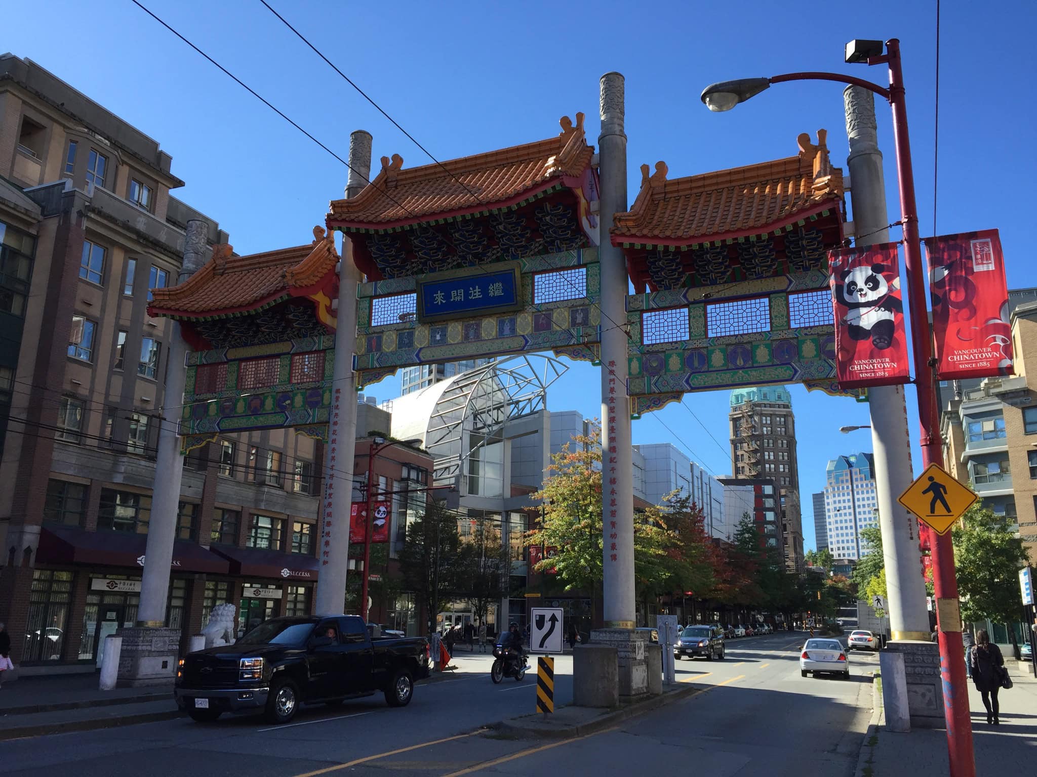 Millennium Gate entrance to Chinatown with traditional Chinese architecture and colourful decorations in downtown Vancouver, British Columbia