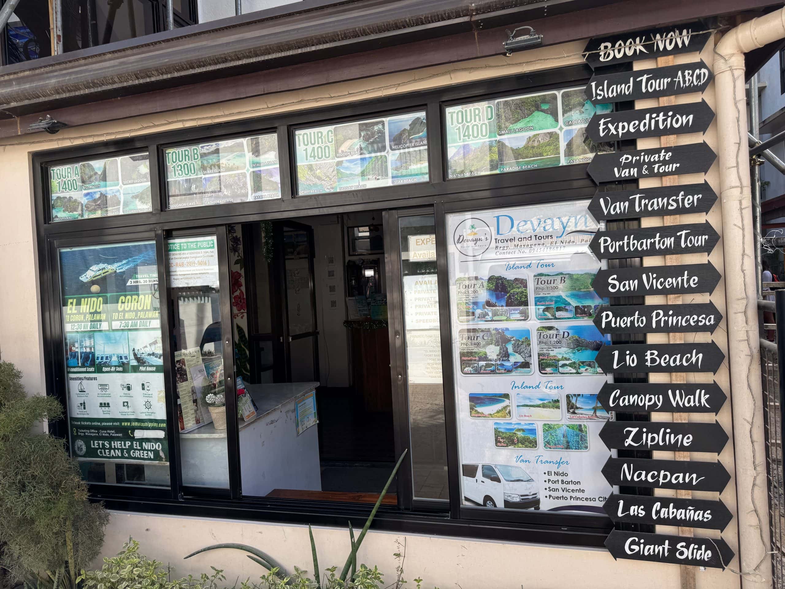 El Nido travel and tours storefront showing island hopping tour options transport services and popular destinations in Palawan Philippines