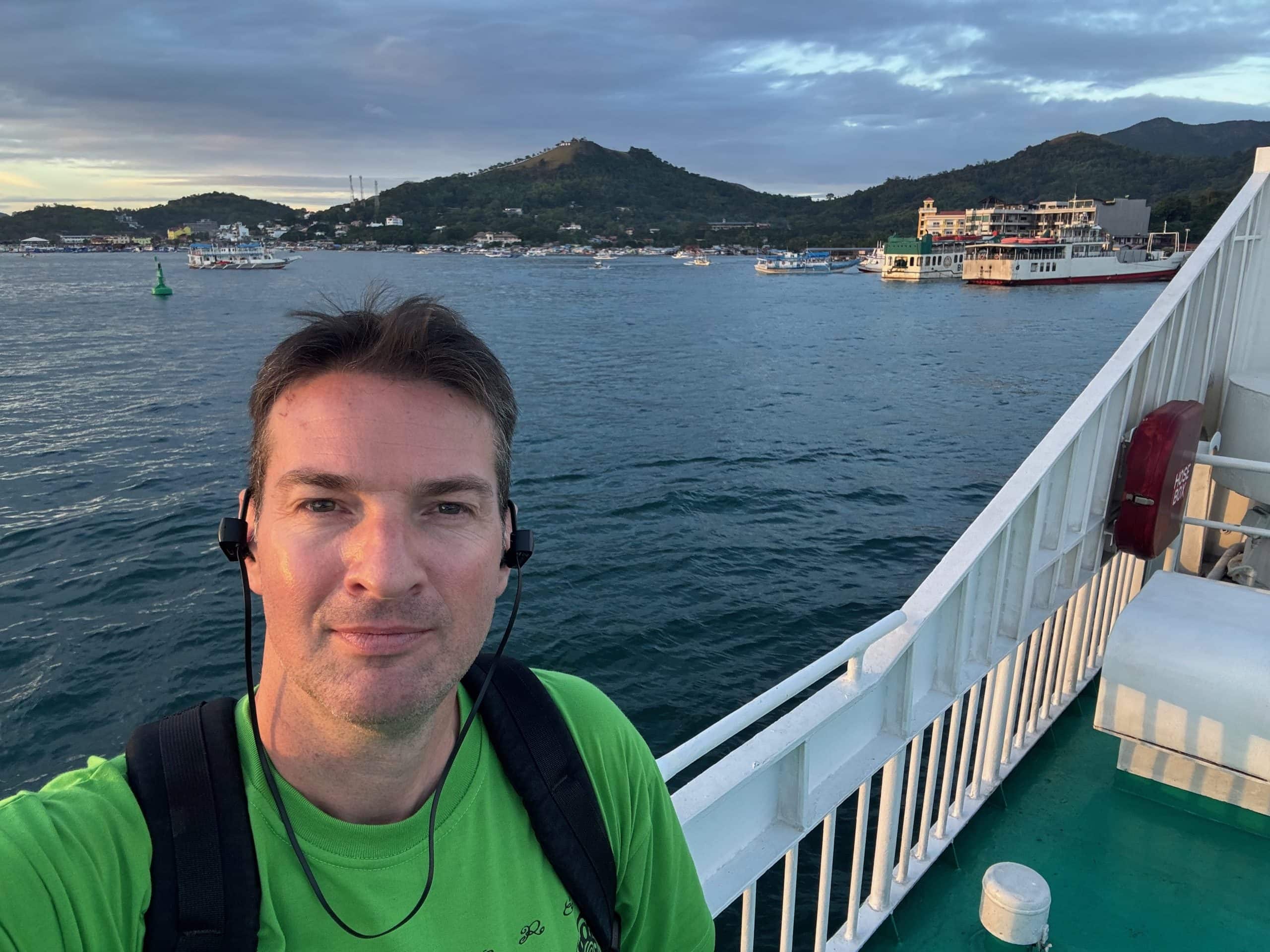 View from the El Nido to Coron ferry in Palawan, Philippines, showing coastal scenery and island landscapes during the journey.
