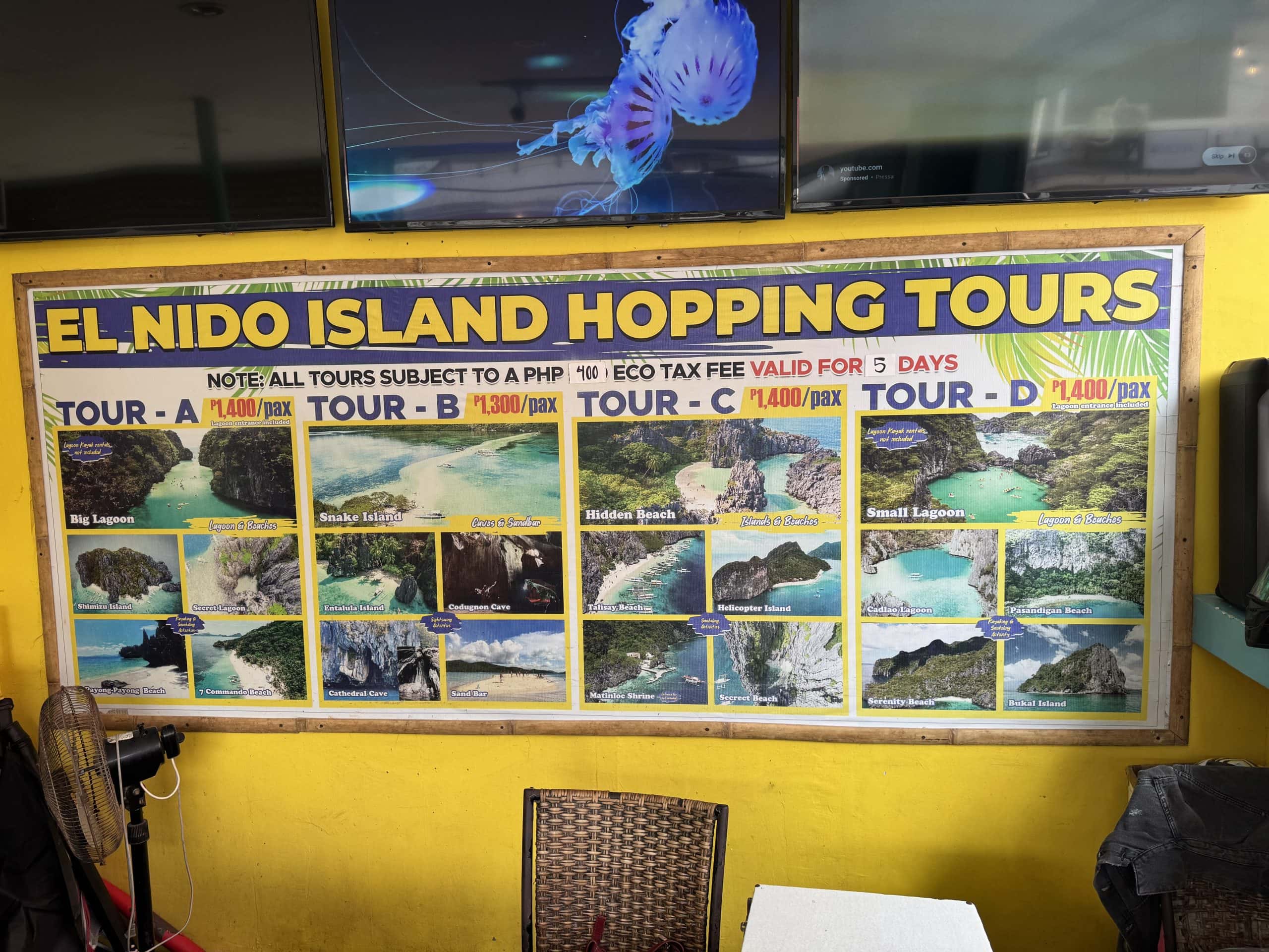El Nido island hopping tour board showing Tour A, B, C, and D destinations including lagoons, beaches, caves, and snorkeling spots in Palawan Philippines.