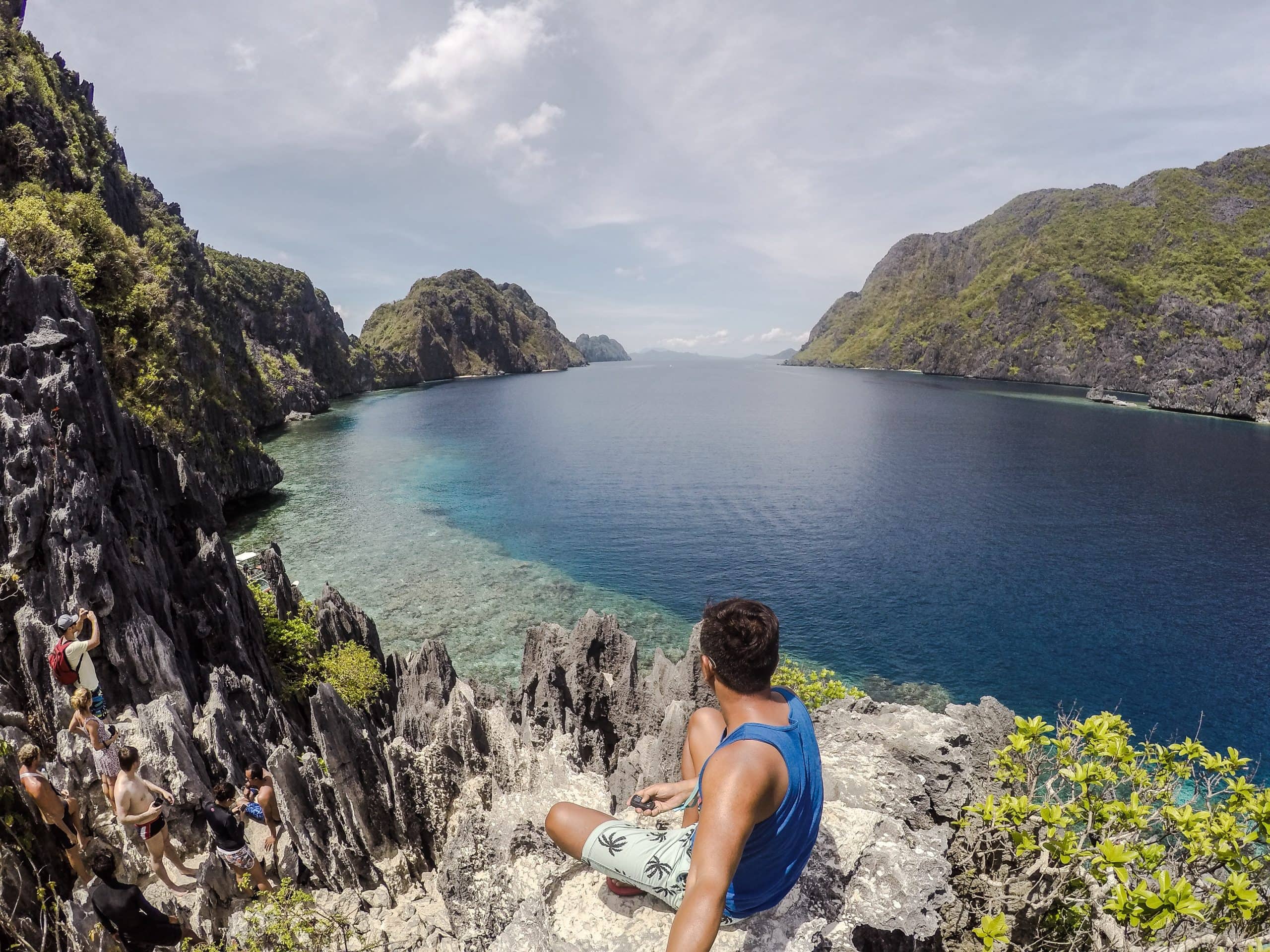 View from the Matinloc Shrine viewpoint during El Nido Tour C with dramatic limestone cliffs and deep blue water in Palawan, Philippines.