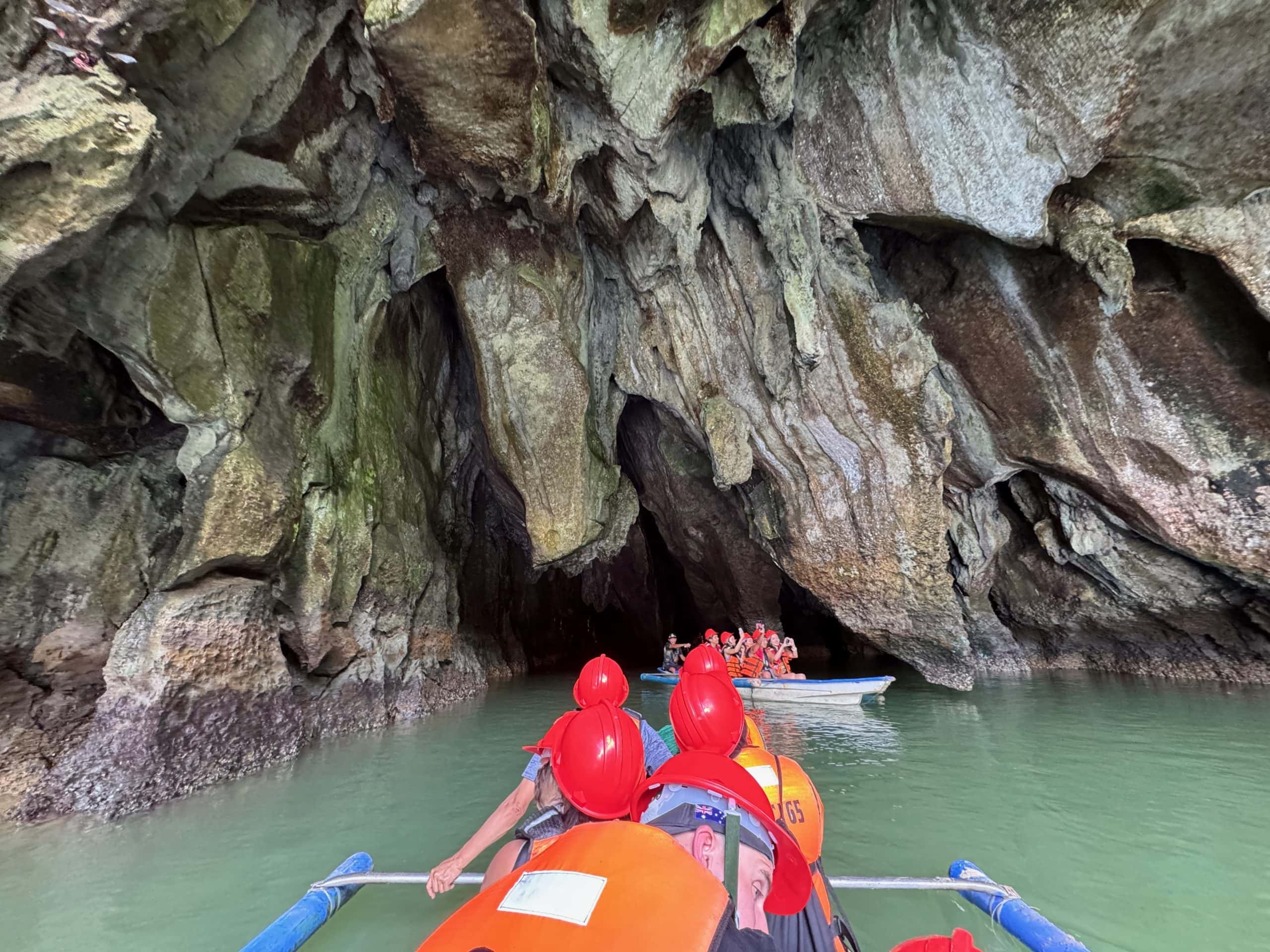 Visitors entering the Puerto Princesa Underground River by boat in Palawan, one of the Philippines’ most famous natural attractions.
