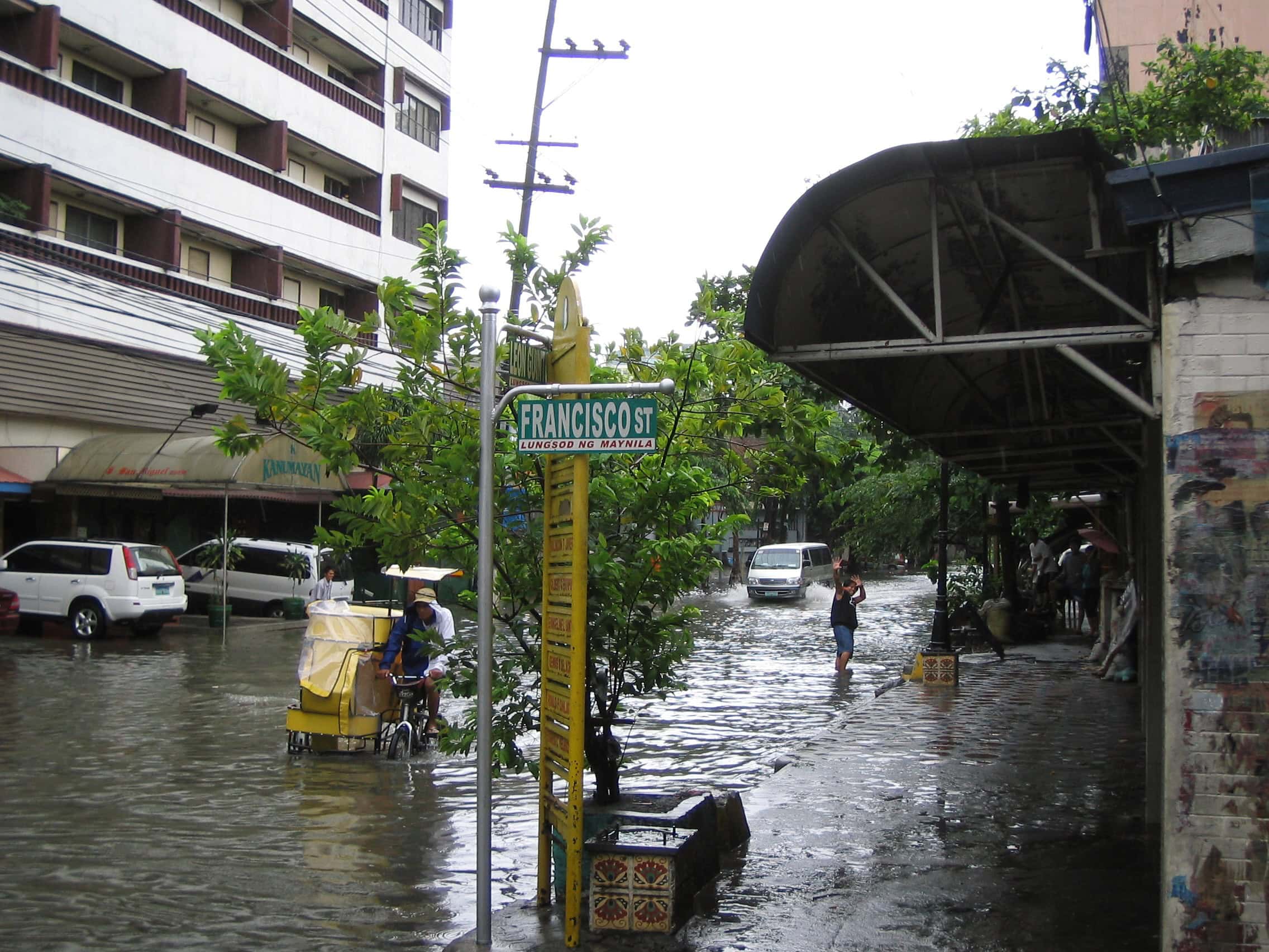 A flooded street in Manila during the wet season after a typhoon, photographed during my student exchange in the Philippines in 2007.