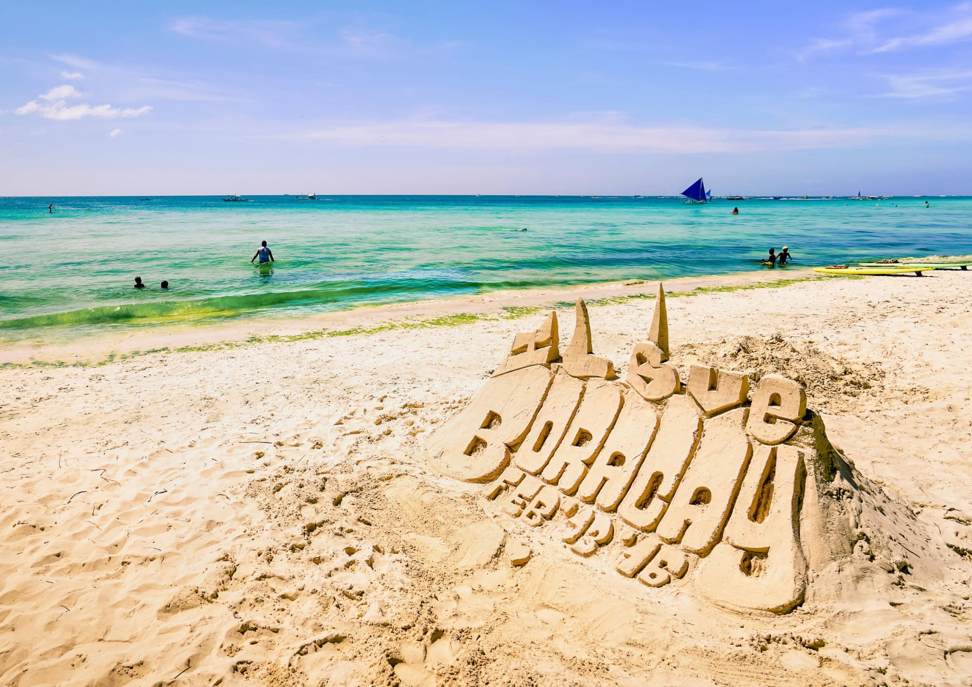 White Beach in Boracay with soft white sand and clear turquoise water.