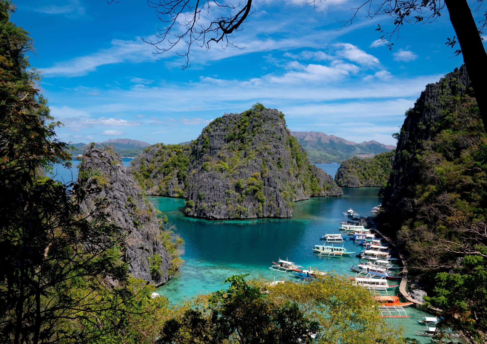 View across the turquoise waters and limestone islands of Coron in northern Palawan.