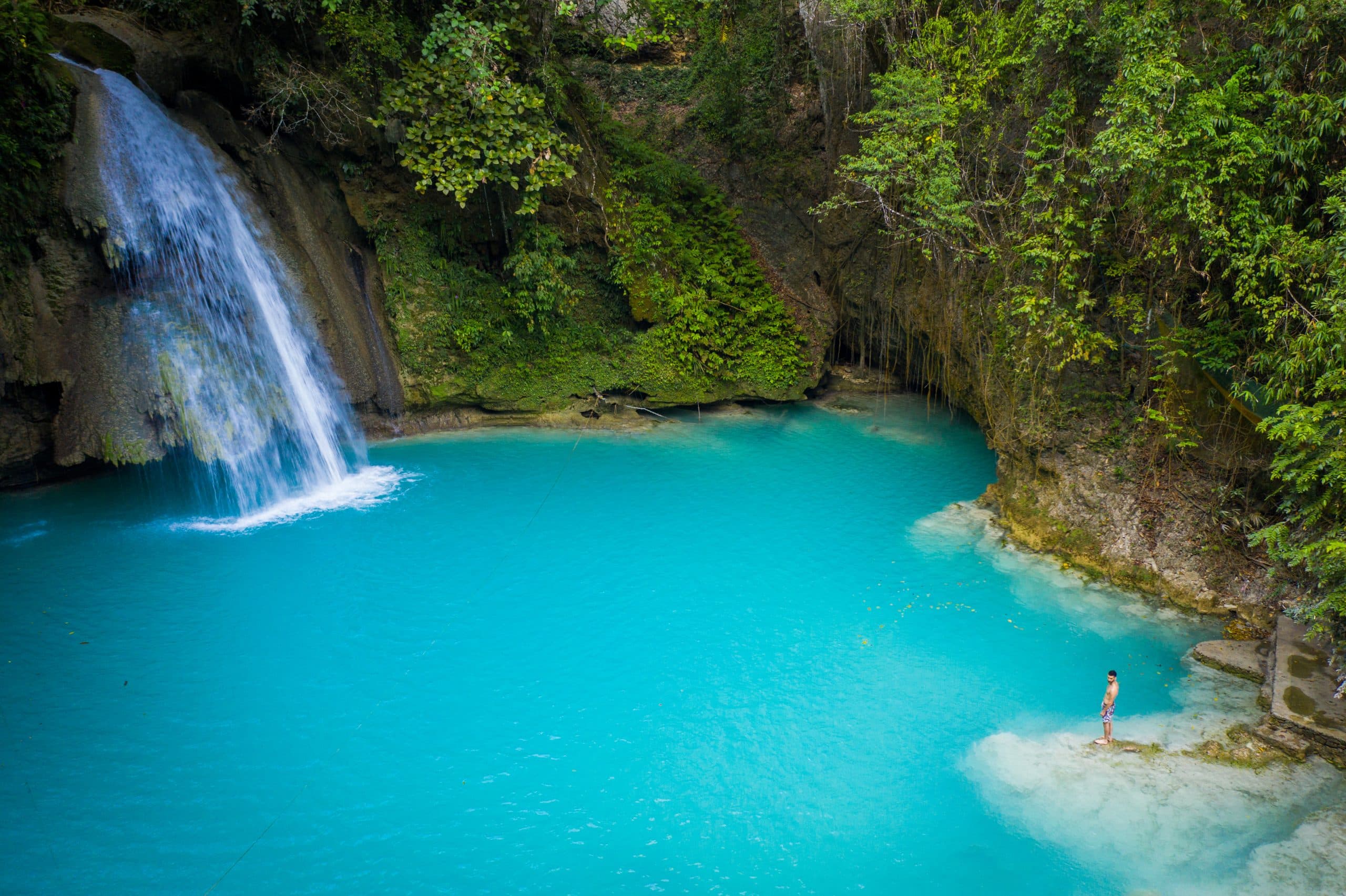 Turquoise water and lush tropical scenery at Kawasan Falls in Cebu, Philippines, one of the island’s most popular adventure destinations.